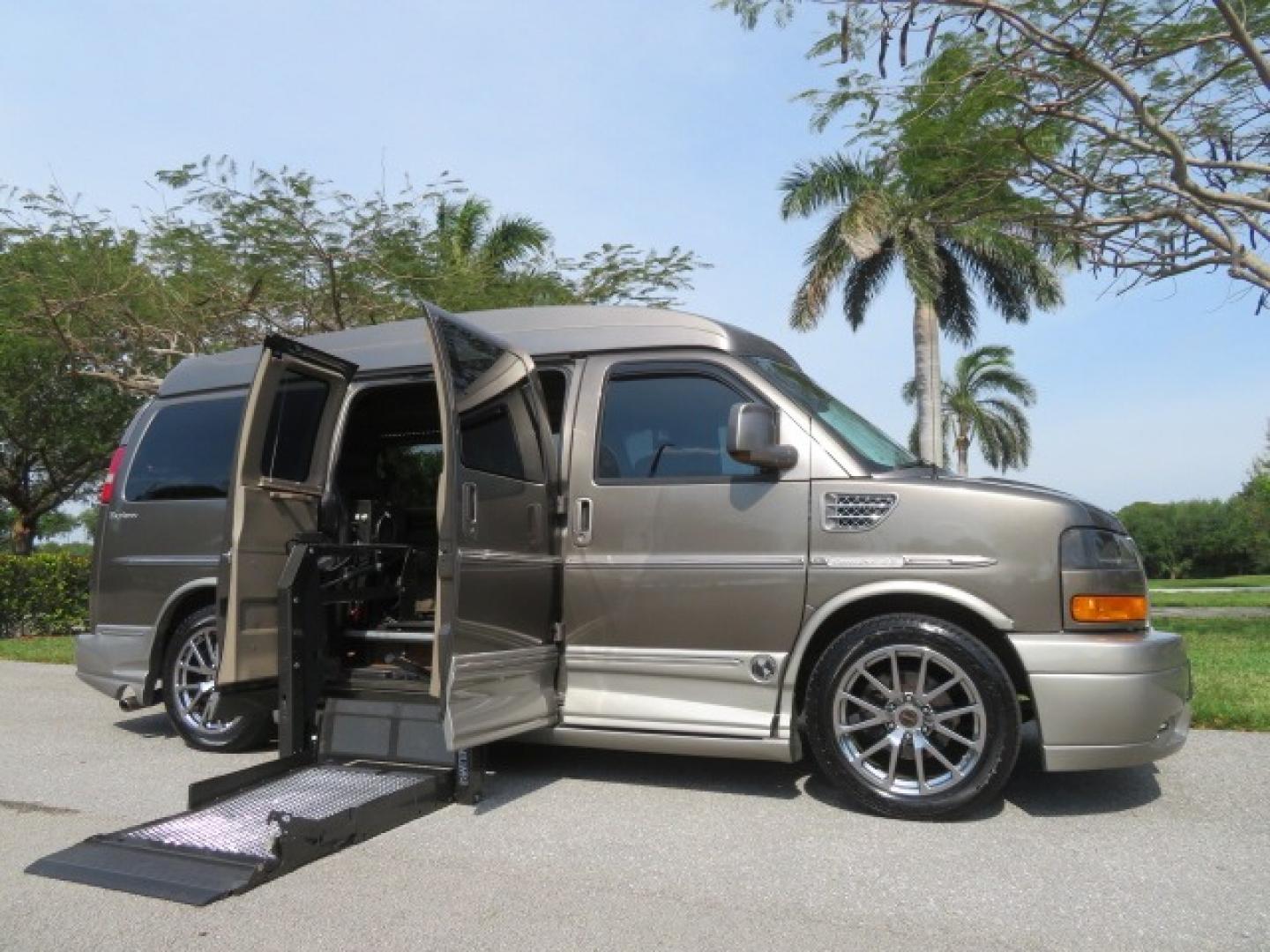 2013 /Beige Two Tone GMC Savana RV G1500 3LT (1GDS7DC45D1) with an 5.3L V8 OHV 16V engine, 4-Speed Automatic transmission, located at 4301 Oak Circle #19, Boca Raton, FL, 33431, (954) 561-2499, 26.388861, -80.084038 - You are looking at a Gorgeous 2013 GMC Savana 1500 High Top Conversion Van Explorer Limited SE Package Handicap Wheelchair Conversion Van with 72K Original Miles, Side Entry Braun Millennium Series Wheelchair Lift, Rubber Floor, Q-Straint Tie Down System, Navigation, Back Up Camera, Huge flat Screen - Photo#1